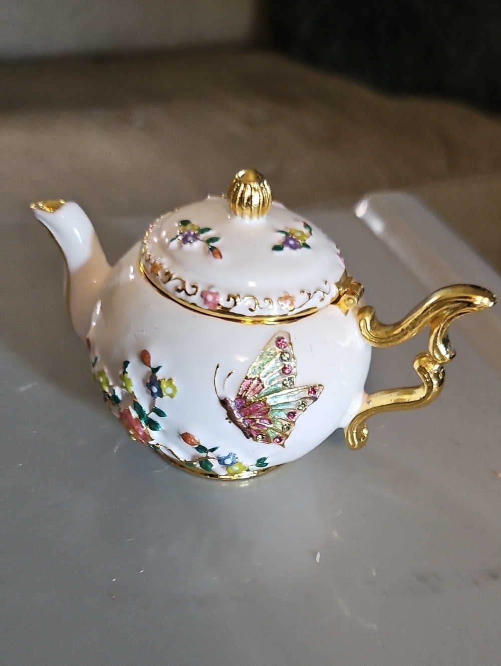 White Porcelain Teapot Trinket Box with Gold Accents and Floral Butterfly Design